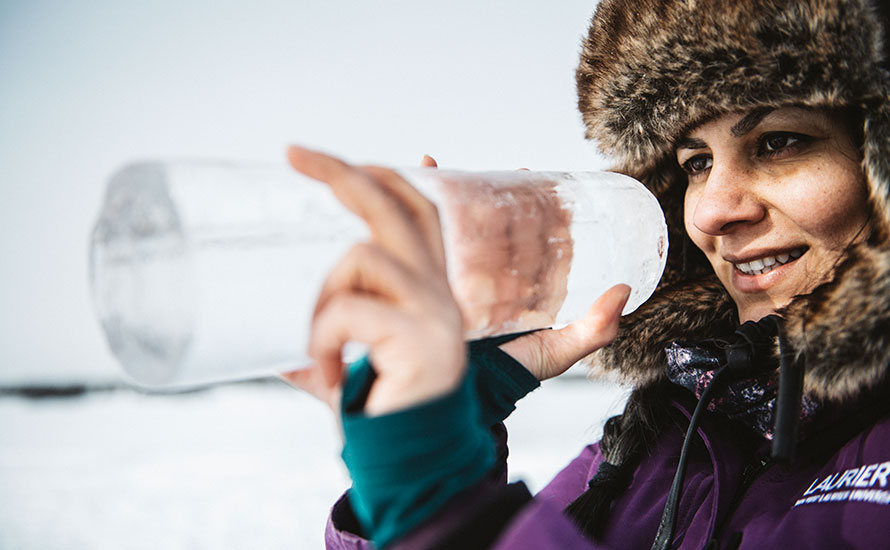 Homa Kheyrollah Pour examining ice sample